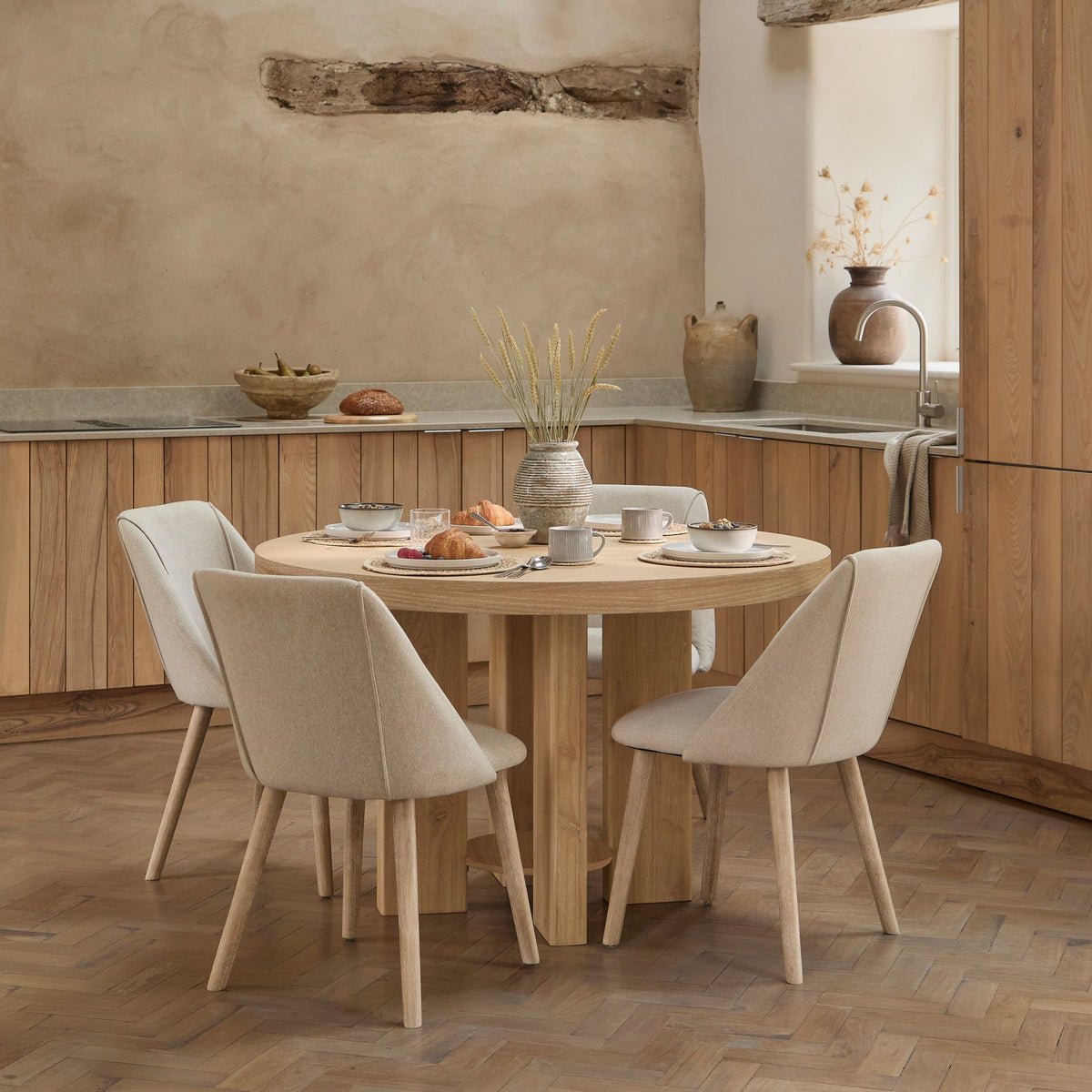 Marlon Whitewash Oak Round Dining Table Set - 4 Seater - Freya Sand Dining Chairs - Whitewash Oak Legs
